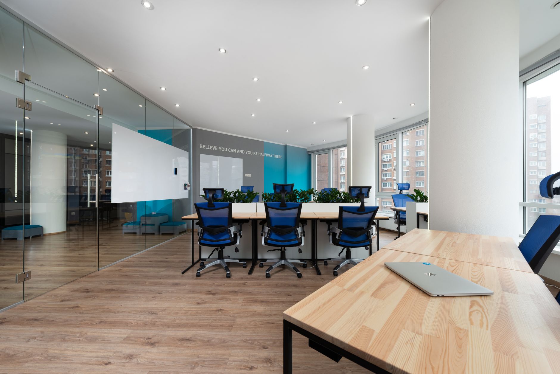 Open desks and a closed laptop